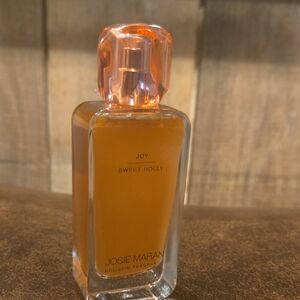 Josie Maran Sweet Holly Fragrance in Orange Bottle